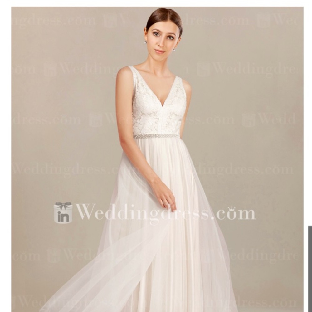 Ivory wedding gown with embroidery & tulle